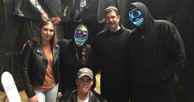 A photo of firefighters dressed up and scary on Hallowe'en.