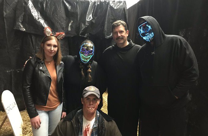 A photo of firefighters dressed up and scary on Hallowe'en.