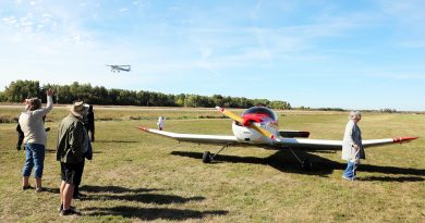 A photo of airplanes at an airport.