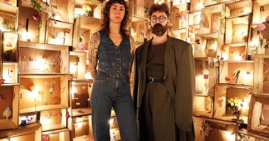 Diefenbunker artists share flower power Two artists pose in front of a work.