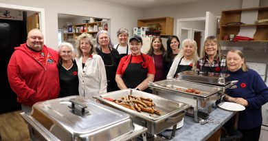 Galetta CA hosts the CAF for breakfast A group of ladies pose in front of breakfast.