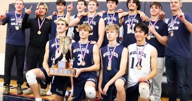 A photo of a volleyball team.