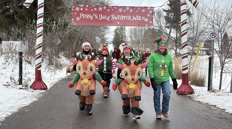 People in ugly sweaters go for a walk.