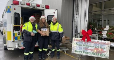 Police briefs: OPP Festive RIDE week three, Youth charged with child sex assault charges, Disappearance of Baldwin now murder Lanark paramedics pose beside an ambulance.