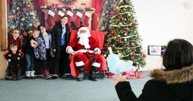 Standing room only at Santa brunch A group of kids pose with santa.
