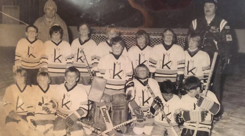 A photo of a hockey team from the '70s.