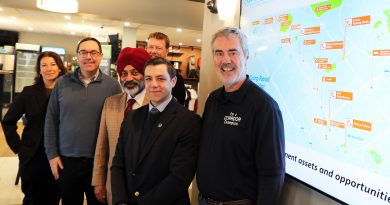 A group of people pose for a photo.