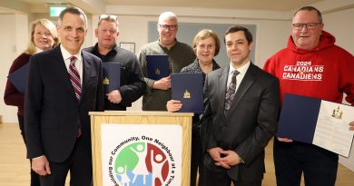 A group of people pose for a photo.