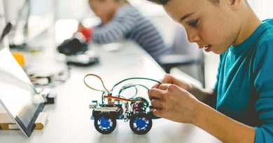 A photo of a kid working on a project.