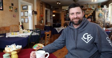 Dunrobin’s Lawson ready to lead Ottawa A man sits in a coffee shop.