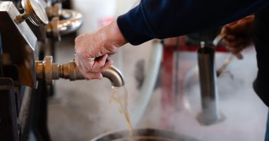 A photo of a maple syrup container.