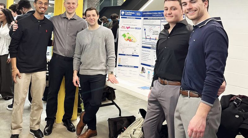 A group pose for a photo.