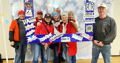 A group of people pose for a photo.