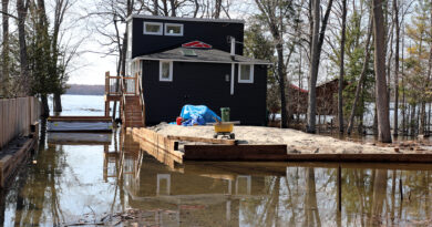 A house surrounded by water.
