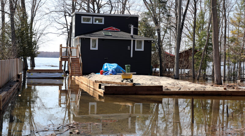 A house surrounded by water.