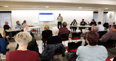 A man leads a meeting.