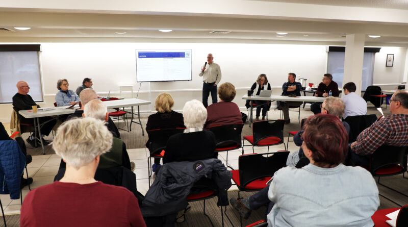A man leads a meeting.