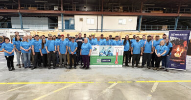 A group of people pose for a photo.