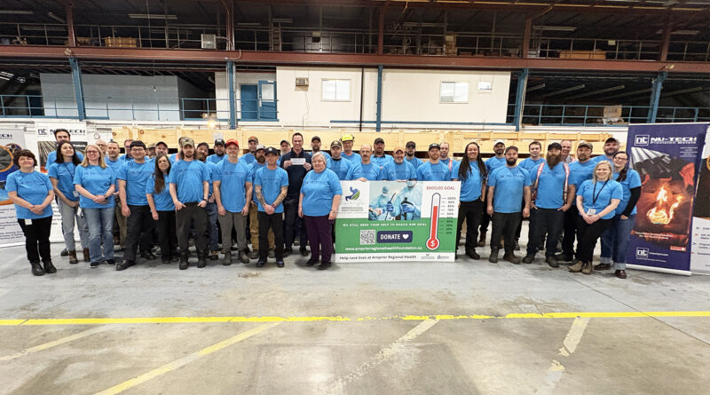 A group of people pose for a photo.