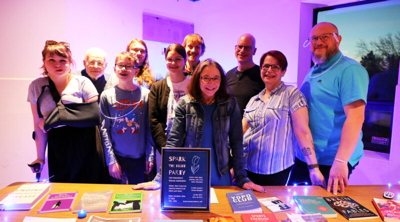 A group of people pose for a photo.