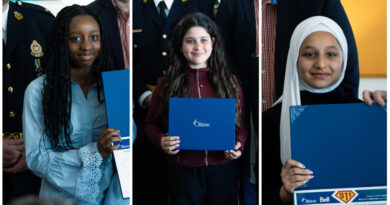 A photo of three award winners.