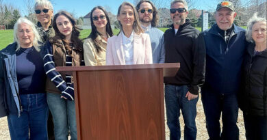 A group of people pose for a photo.