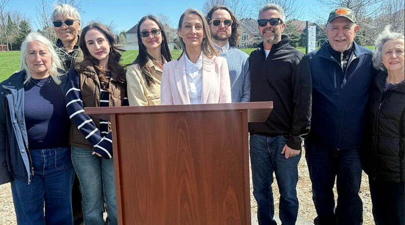 A group of people pose for a photo.