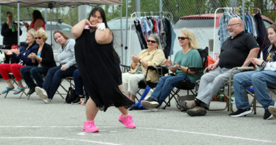A woman walks the catwalk.
