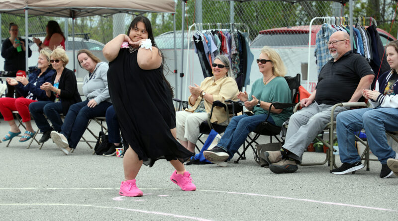 A woman walks the catwalk.
