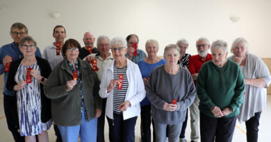 A group photo of first place winners.