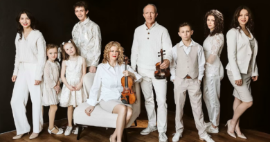 A photo of a band in white.