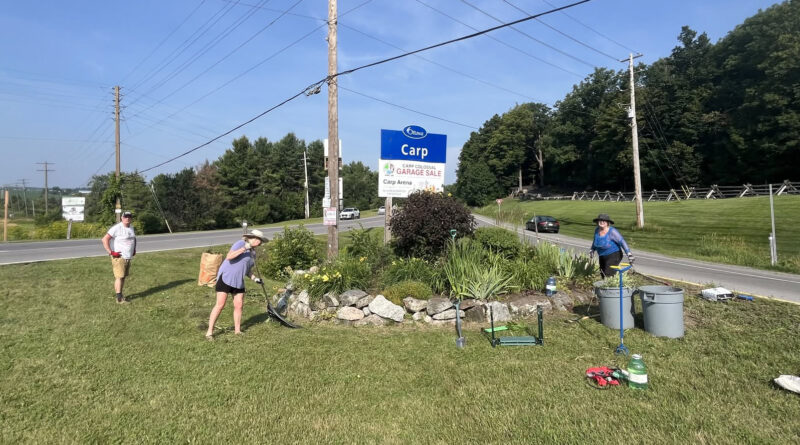 A photo of people gardening.