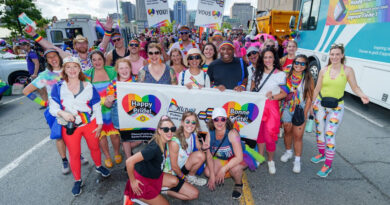 A group poses for a photo.